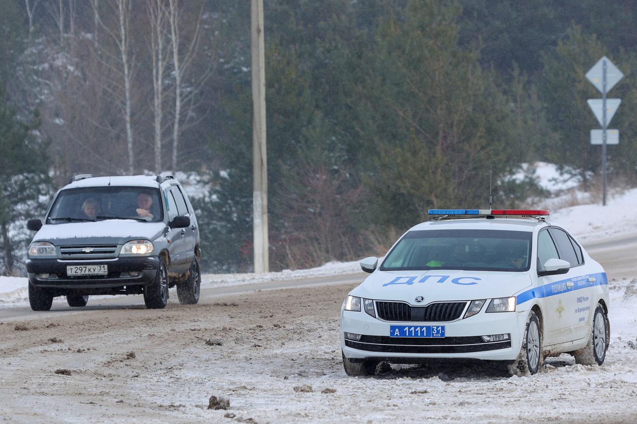 Police guard road near Russian Il-76 military plane crash site in Belgorod region